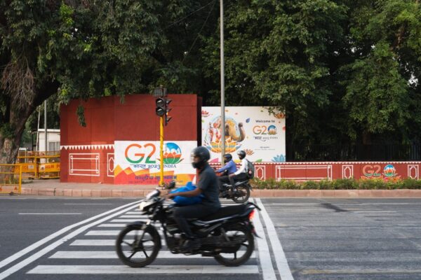 Motorbike riding past G20 Summit in India
