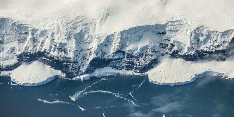 Small island off the coast of Antarctica. Photo by Matt Palmer on Unsplash